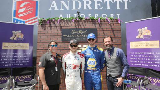 4 men in front of Wall of Gratitude