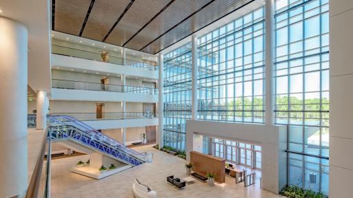 View of Lobby with lots of windows from inside a three story building