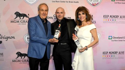 Larry Ruvo, Pitbull and Camille Ruvo on the red carpet at Keep Memory Alive's 22nd annual Power of Love gala