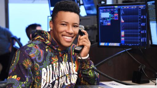 Saquon Barkley answering phones for Cantor fundraiser.