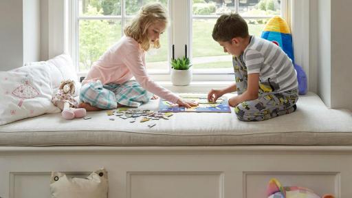 Children in a room playing.