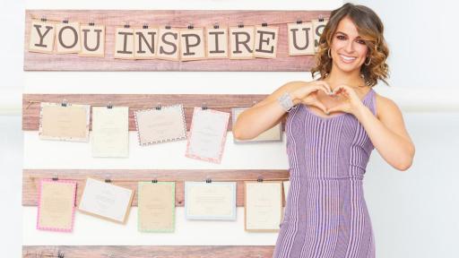 Victoria Arlen posing with her hands in the shape of a heart