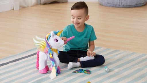 boy playing with Myla the Magical Unicorn