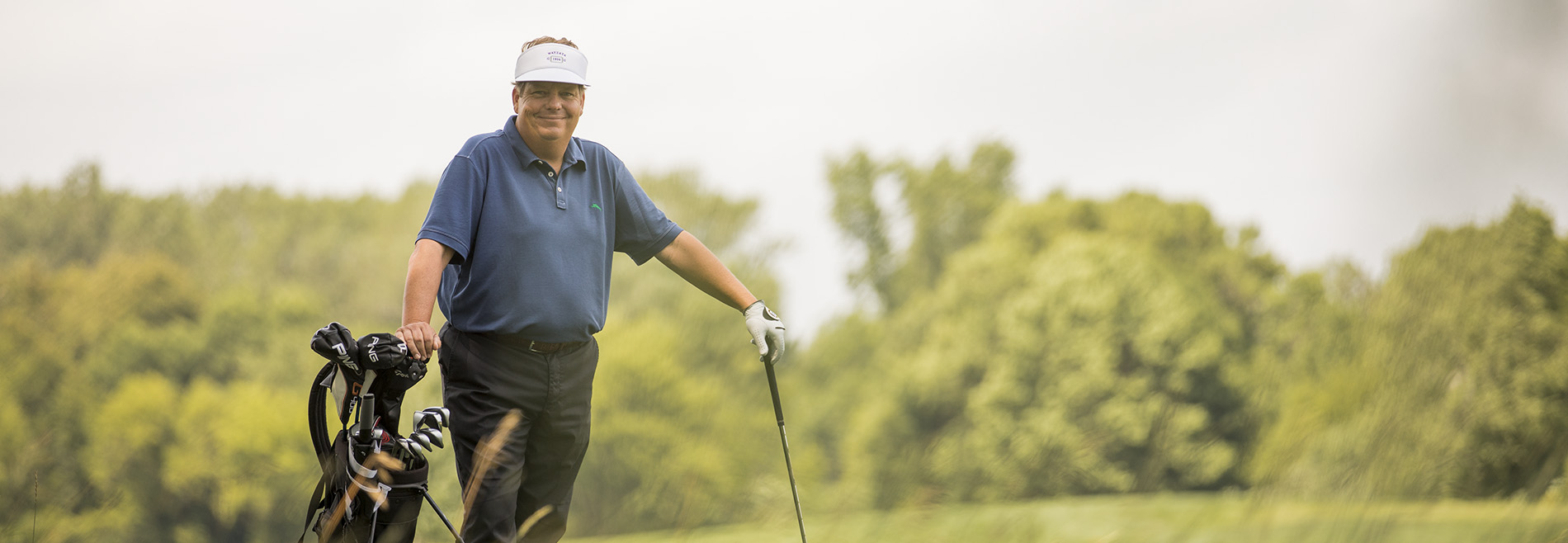 PGA Tour Winner Tim Herron on golf course.