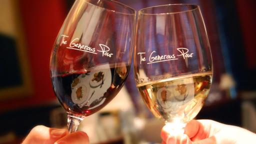 Wine glasses clinked together in a toast.