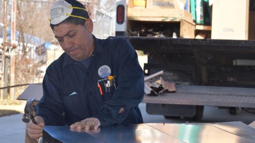 An installation technician from Fresh Air works on new duct work to support the Carrier heating and cooling system that was installed in the home of Ms. Roberson. Carrier donated 100 systems to Habitat for Humanity Houston to support the effort of rebuilding Houston following the devastation of Hurricane Harvey last year.