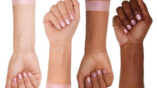 Four arms with different skin tones wearing the Cloud 9 highlighter