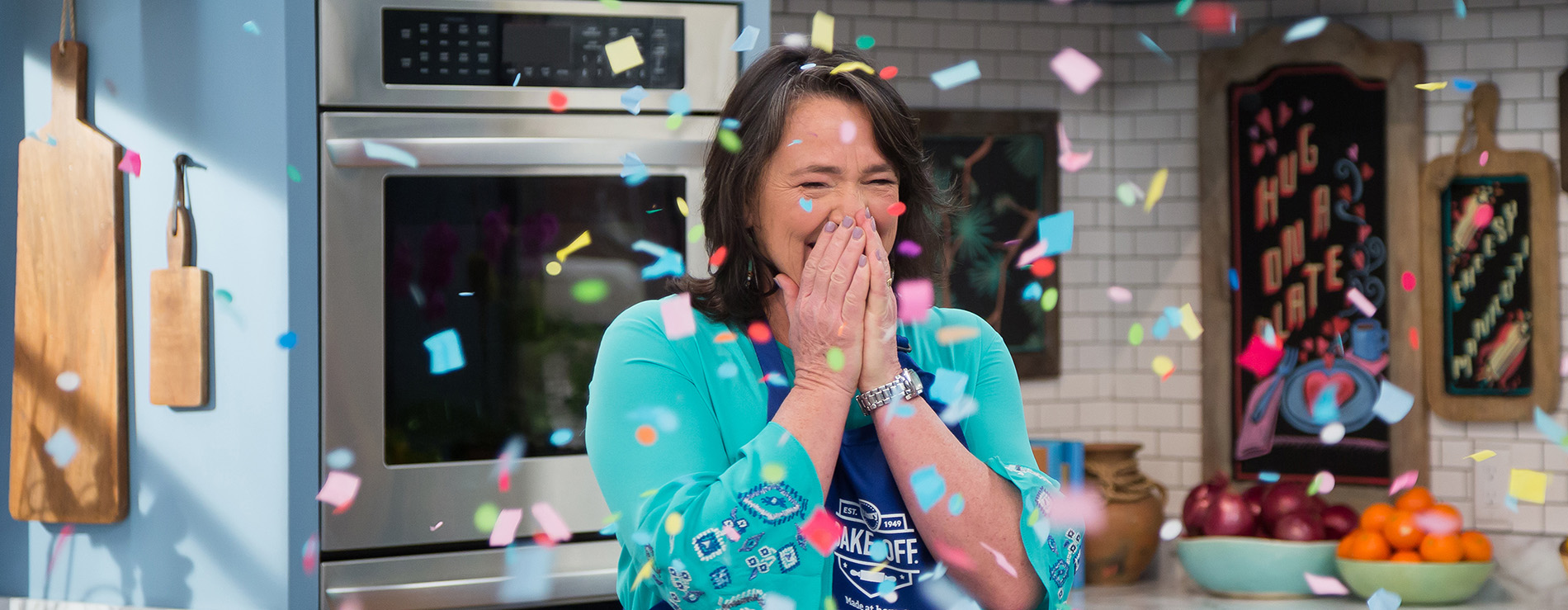 A very happy Amy Nelson is showered with confetti as she learns she won the contest.