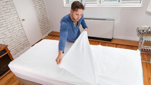 Man removing Peelaways sheets