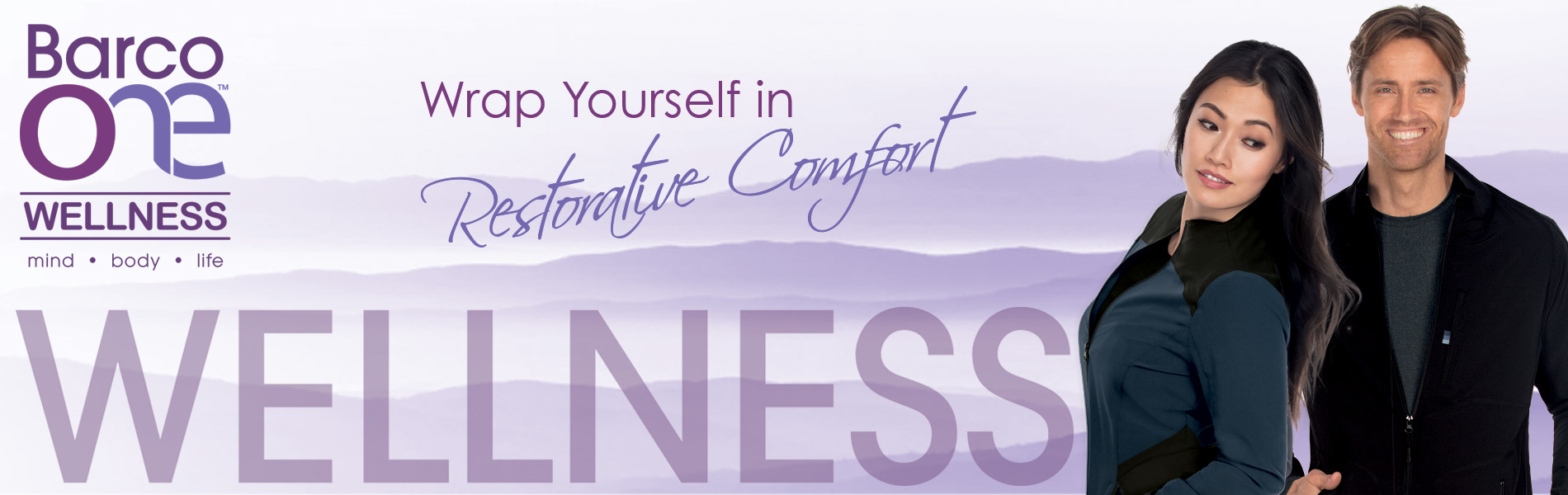 Woman and man wearing Barco uniforms