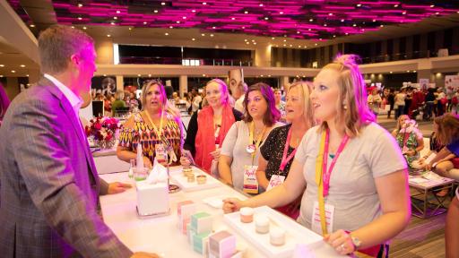 Scott White, CEO, New Avon shares news about Avon skin care products with Avon Representatives at RepFest 2018.