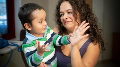 A two year old boy and his mom