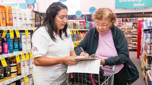 A CVS Pharmacy customer registers for a free wellness screening as part of CVS Health’s annual Project Health campaign.