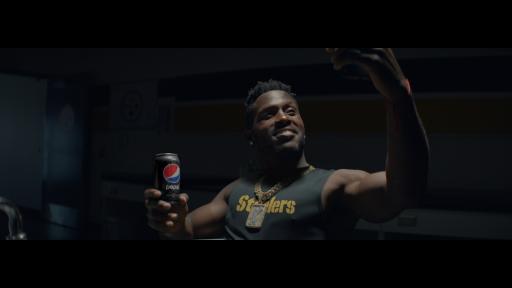 Antonio Brown in ice bath taking selfie