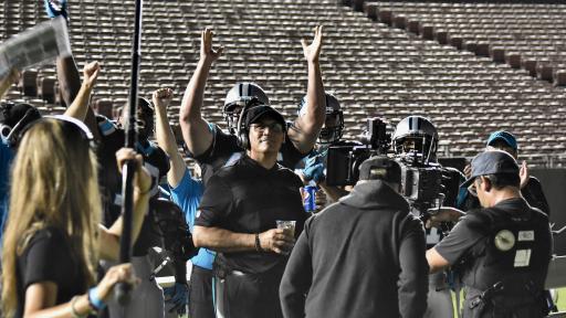 Football team on the sidelines of the field