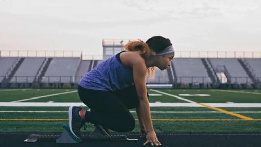 Girl in starting blocks
