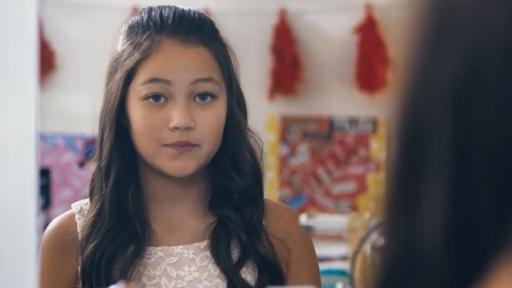 Girl Looking into mirror