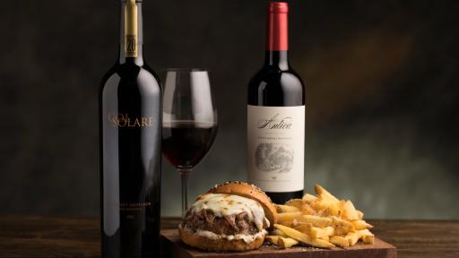 Caramelized Onion Wagyu Burger with glass of wine
