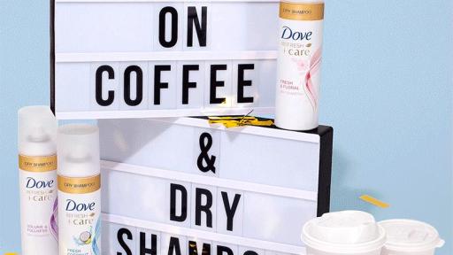 Dunkin' coffee cups and a store sign on a blue background