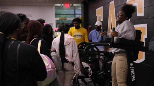 Students get a chance to test out their new weight room during the reveal