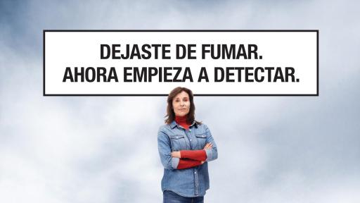 Woman standing on a pile of cigarettes.