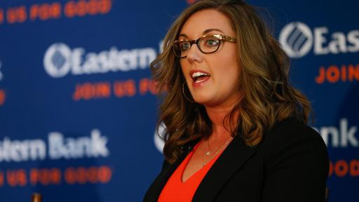 Katelyn Brewer, CEO of Darkness to Light, addresses a crowd at Eastern Bank headquarters in Boston on October 16, 2018.