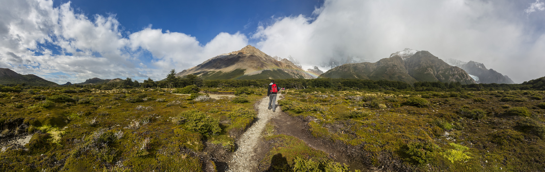 Mountain trail walked by a man
