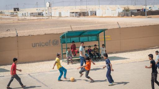 Children playing soccer