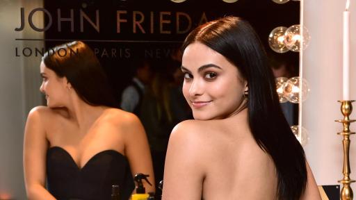 Camila Mendes in front of a mirror