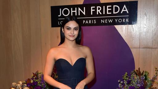 Camila Mendes standing for a photo