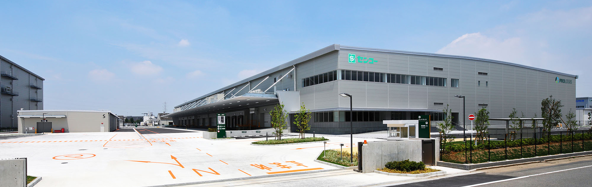 Banner image of the front of a building