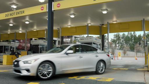 Car exiting the Hertz Fast Lane powered by CLEAR