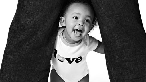 Baby and person's legs