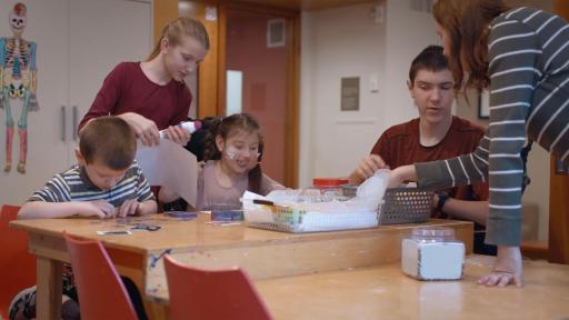 The Warder Family working on crafts together
