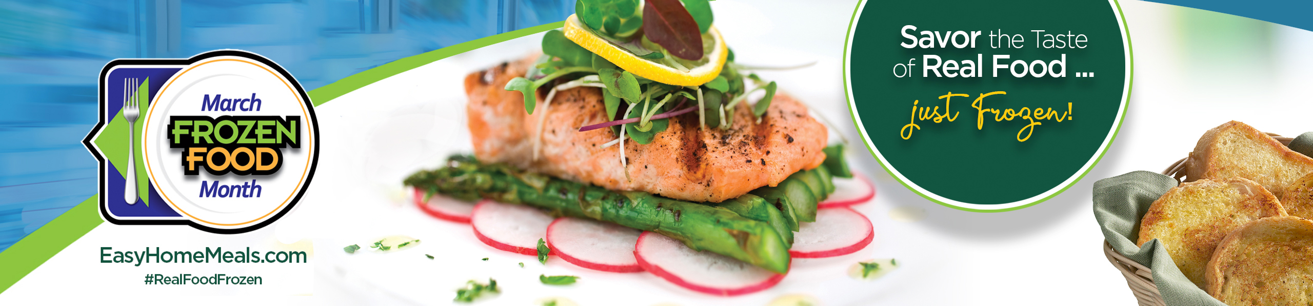 Salmon placed on asparagus, topped with various lettuce leaves.