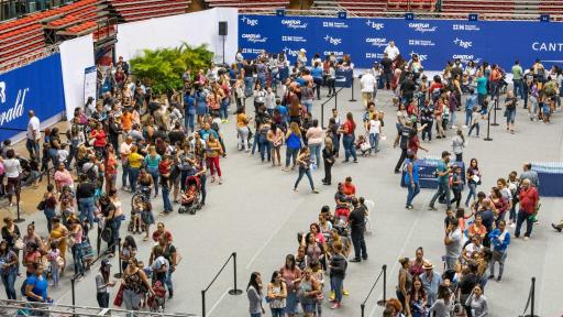 Recipients of the Puerto Rico Family Relief Program awaiting for their $1,000 MasterCard cash card.