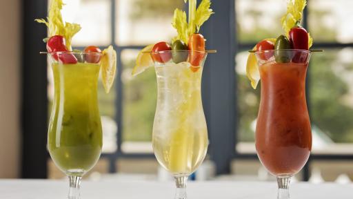 Sadelle's Trio of Bloody Marys on a white tablecloth