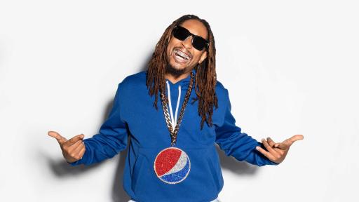 Lil Jon jumping while holding a can of Pepsi