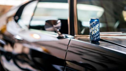 Brisk can on the hood of a car