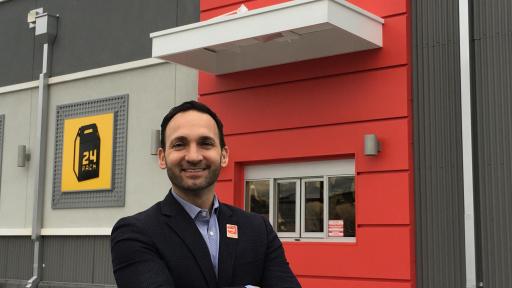 Little girl hugging Paul Macaluso.