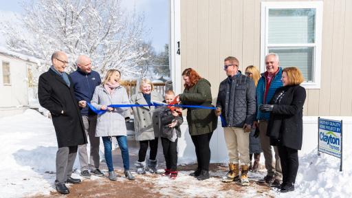 Family picture outside of the home