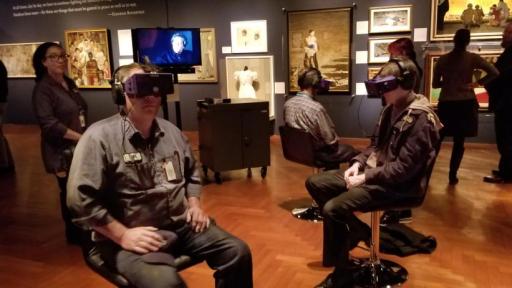 People sitting in chairs wearing the Oculus VR device at the Henry Ford Museum