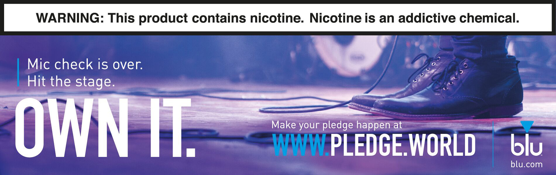 The floor of a music stage someone is standing on