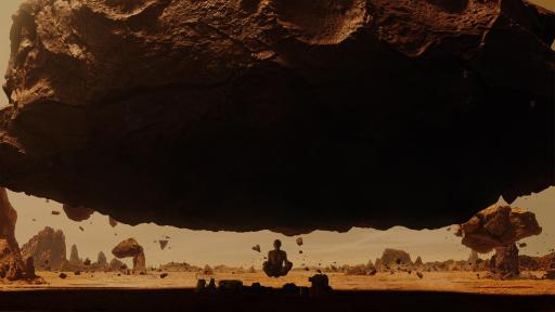 Man hovering and meditating beneath a large floating rock.