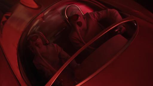 People in hazmat suits in a car.