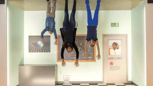 People in a room upside down