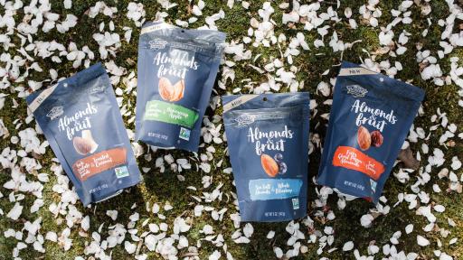 Four different flavored Blue diamond almonds in their blue packages.