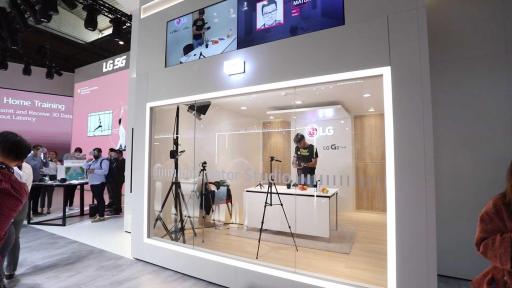 man reviewing LG phone in studio