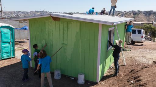 People working on newly built house