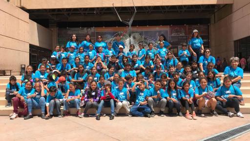 Group of children and volunteers